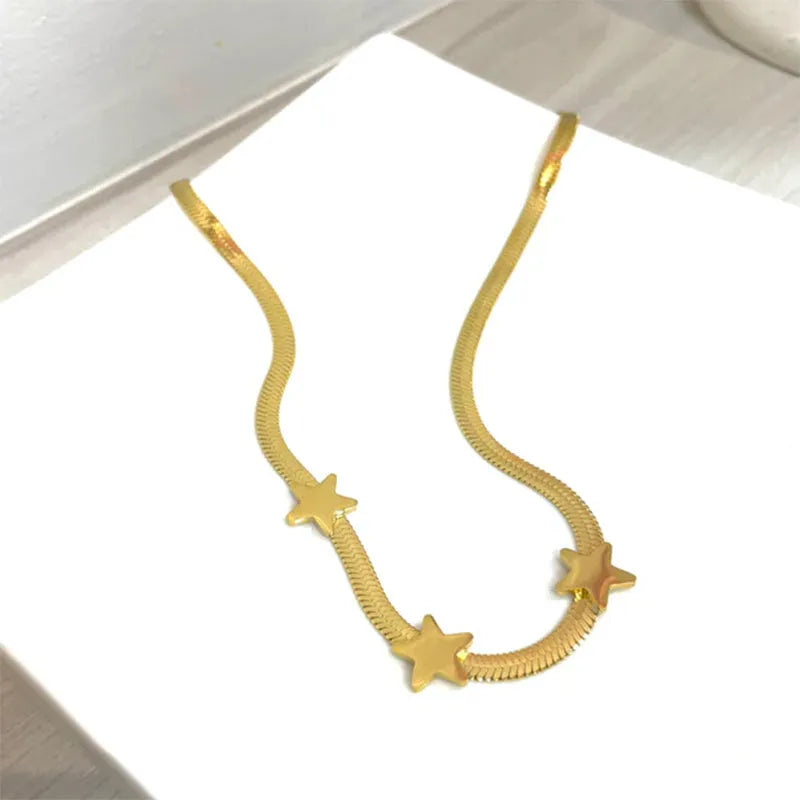 Gold gothic star pendant choker necklace on titanium steel snake chain, 41-50cm adjustable length.