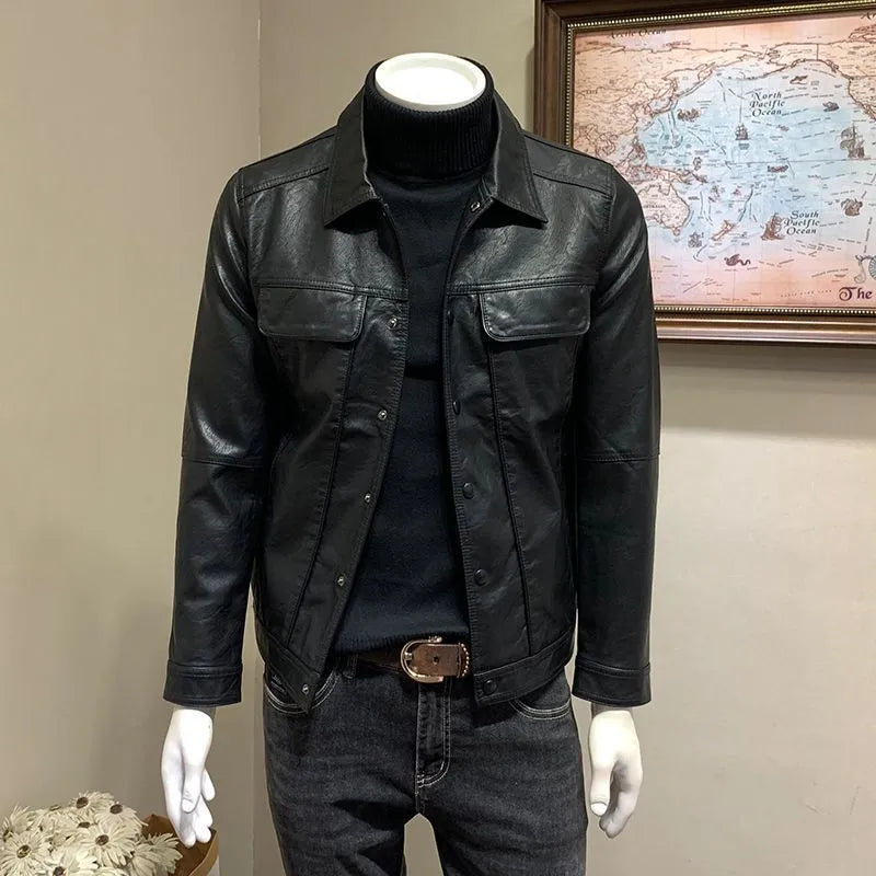Front view of a black men's artificial leather biker jacket with loose fit, medium length, on a neutral background