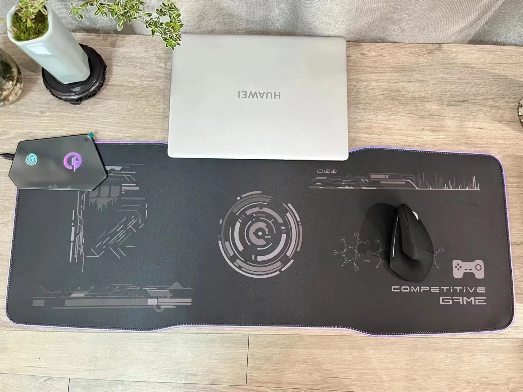Black gaming mouse mat with mech-style graphics showing 300x800mm dimensions and TYPC interface