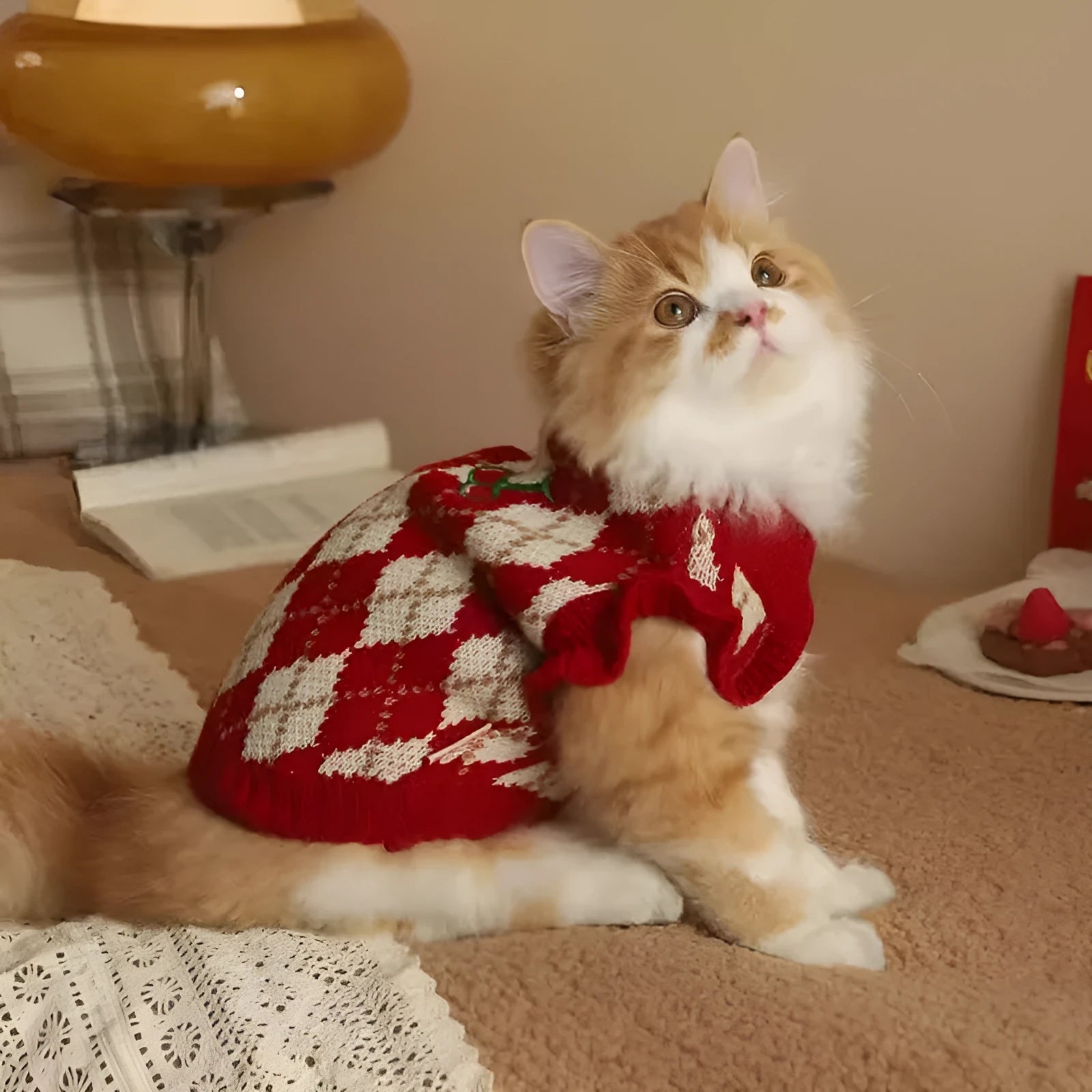 Red cat sweater with rhombic embroidery cherry pattern showing size options for pet clothing