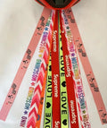 Colourful ribbon streamers attached to a child's helmet for roller skating or cycling decoration.