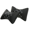 Black quilted artificial leather car headrest cover with coloured stitching lines.