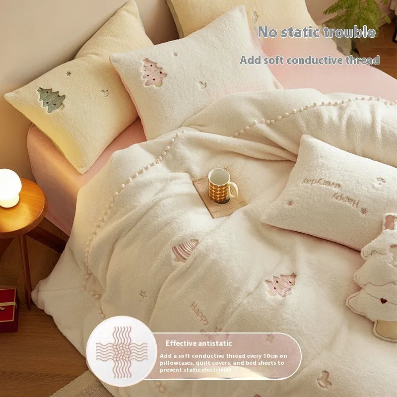 Milk fibre four-piece bedding set with green Christmas tree pattern on a double bed.