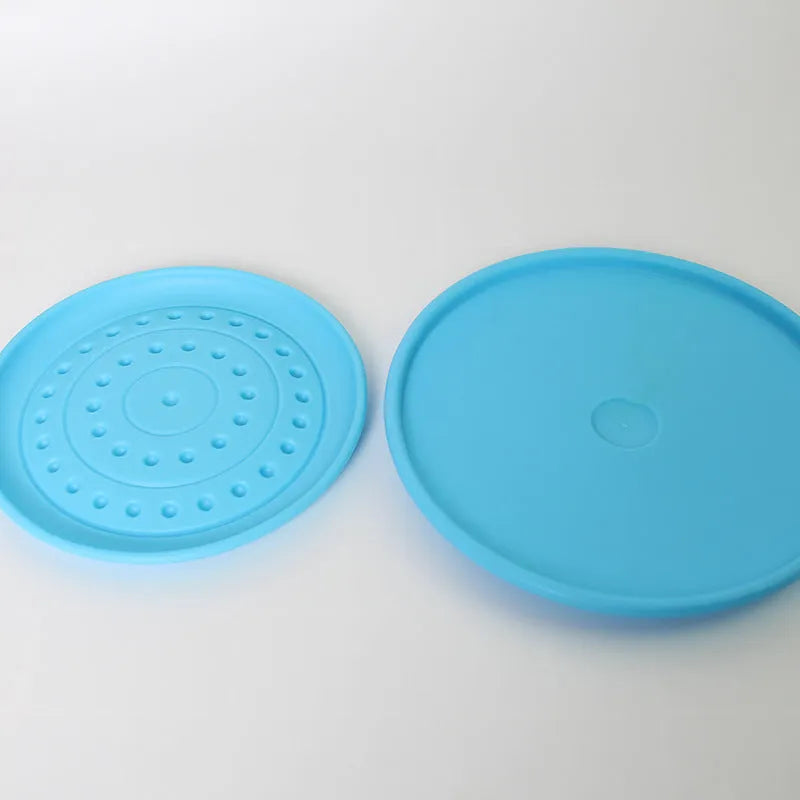 Plastic dog frisbee toy in green colour, large size, for fetch games.
