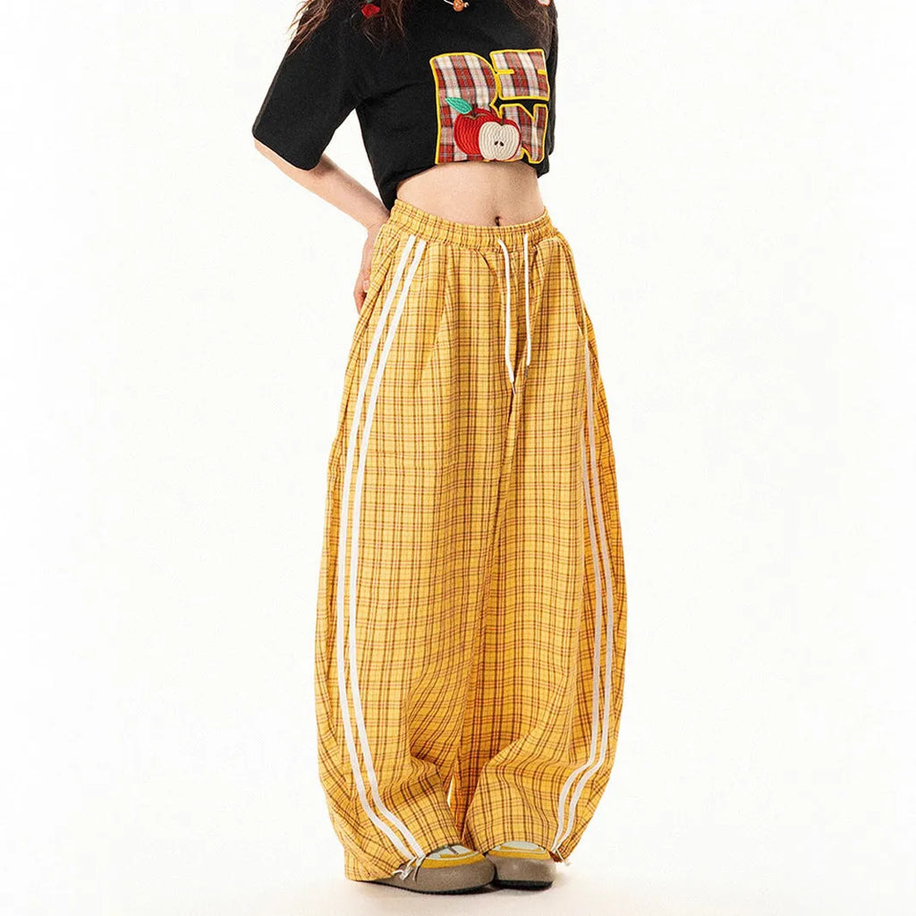 Loose straight drooping wide leg polyester trousers for women with side pockets, available in blue and yellow, sizes S to XXL