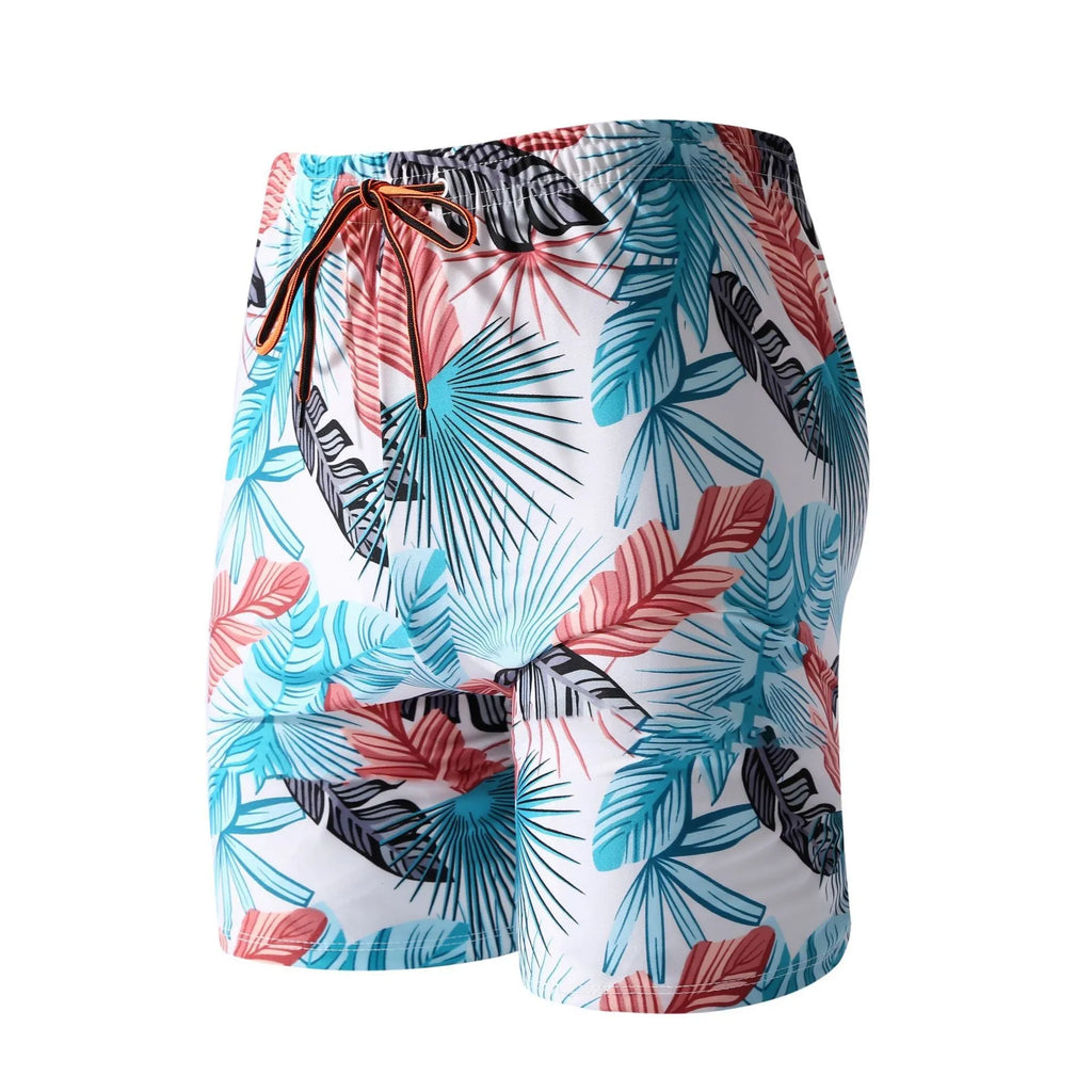 Men's cropped beach swimming trunks in multicolour leaf pattern with briefs style