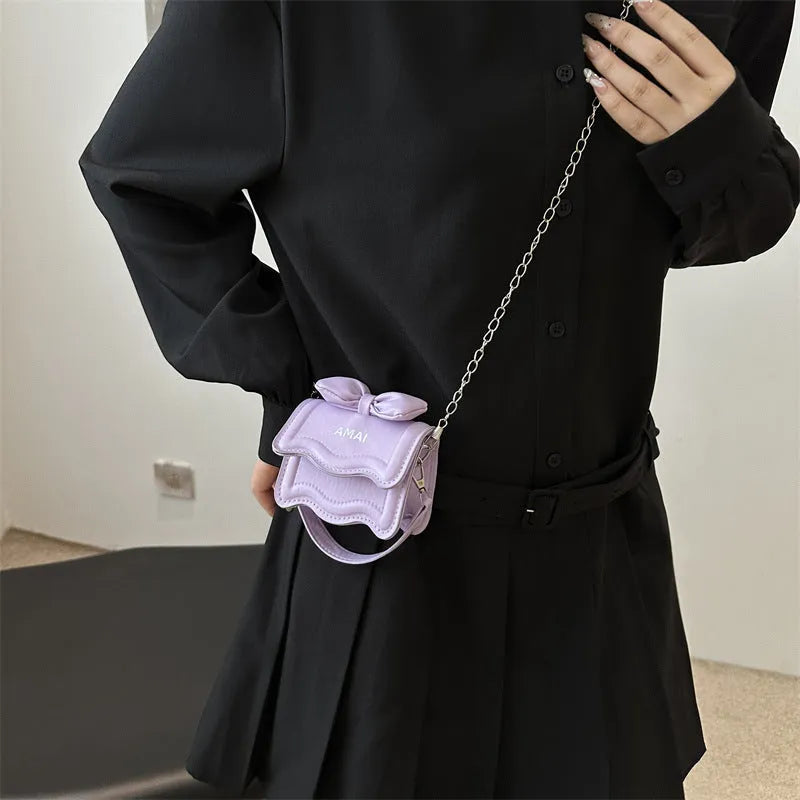 Mini PU crossbody handbag in multiple colours including black, pink, and silver