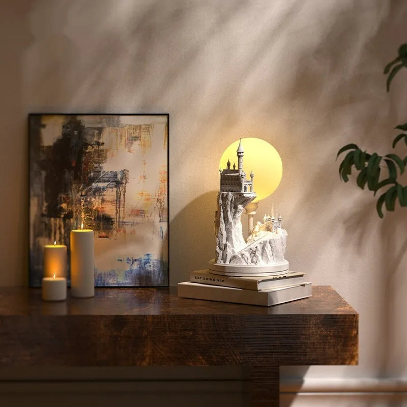 White composite gypsum table night lamp with plug and wire switch on a surface.