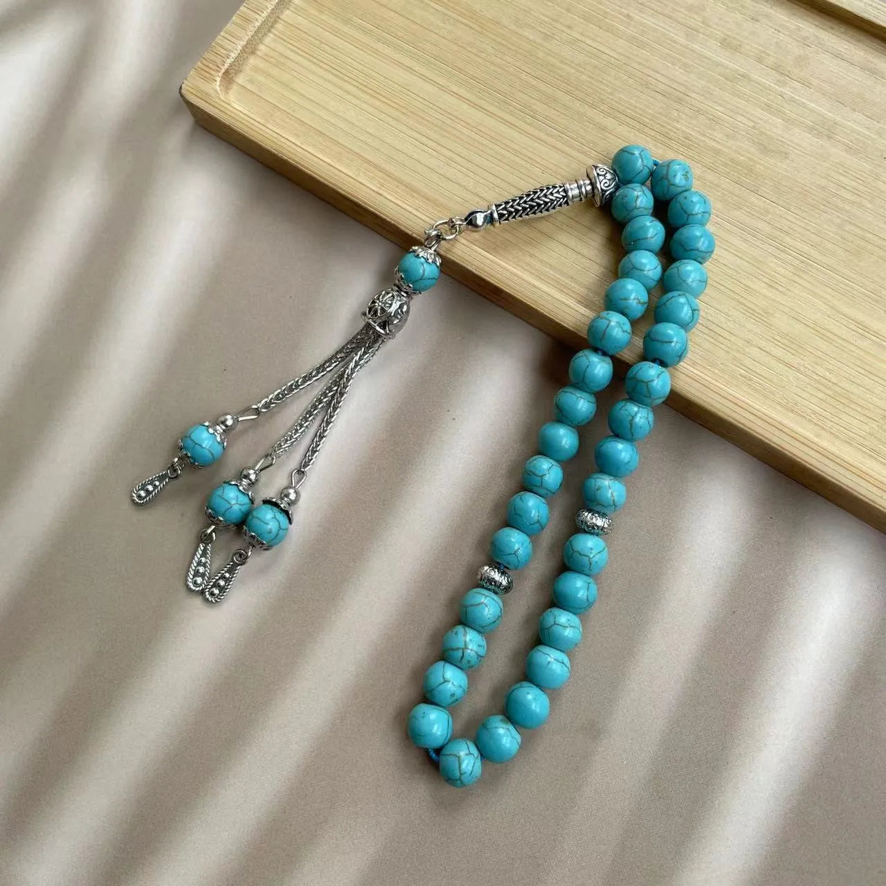 Sky blue stone Muslim prayer bracelet with 8mm beads for daily worship counting.