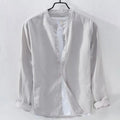 Man wearing a loose fit light blue linen cotton long sleeve casual shirt