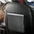 Car leather waterproof hanging garbage bag 27.5x26cm in black with light strip, shown inside a vehicle door pocket