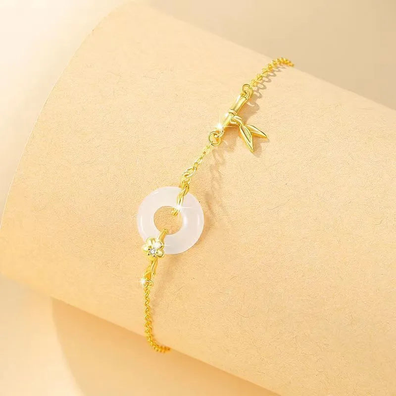 Silver gold electroplated women's bracelet with white chalcedony gemstone and starry sky design elements