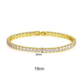 Women's copper tennis bracelet with geometric open-work design and cubic zirconia in gold finish on a light background