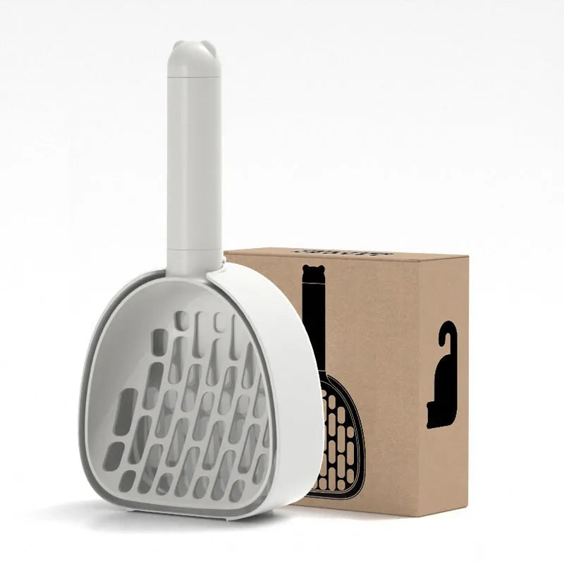 White ABS plastic cat litter scoop with a stand-up base and hidden bag storage compartment.