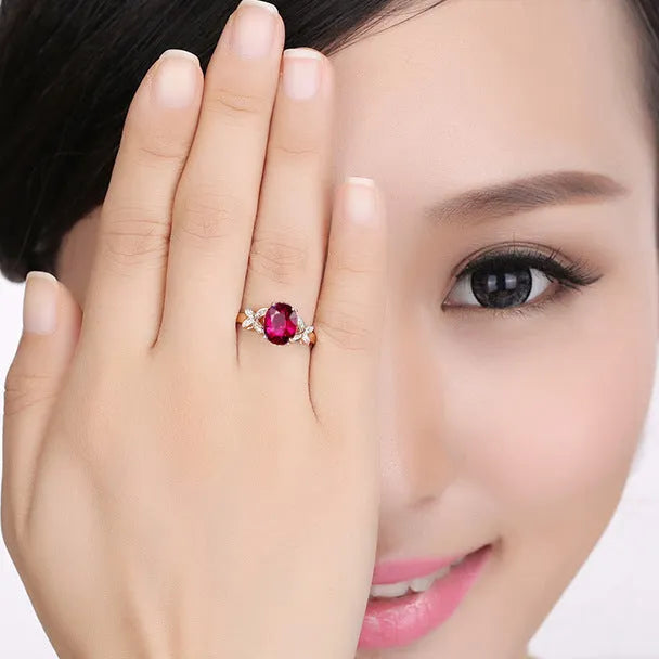 Women's butterfly ring with heart shape design in 18k rose gold plating with red enamel colour option