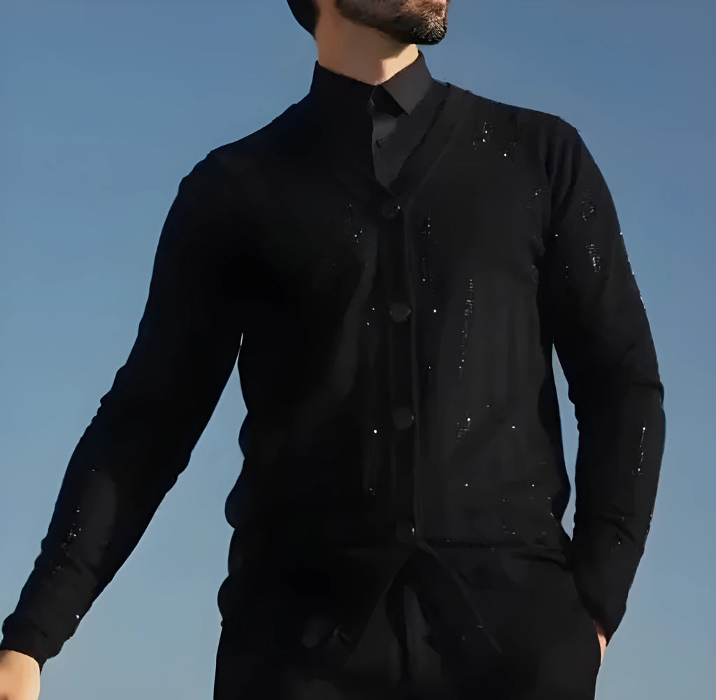 Men's black sequin cardigan with open front design on display