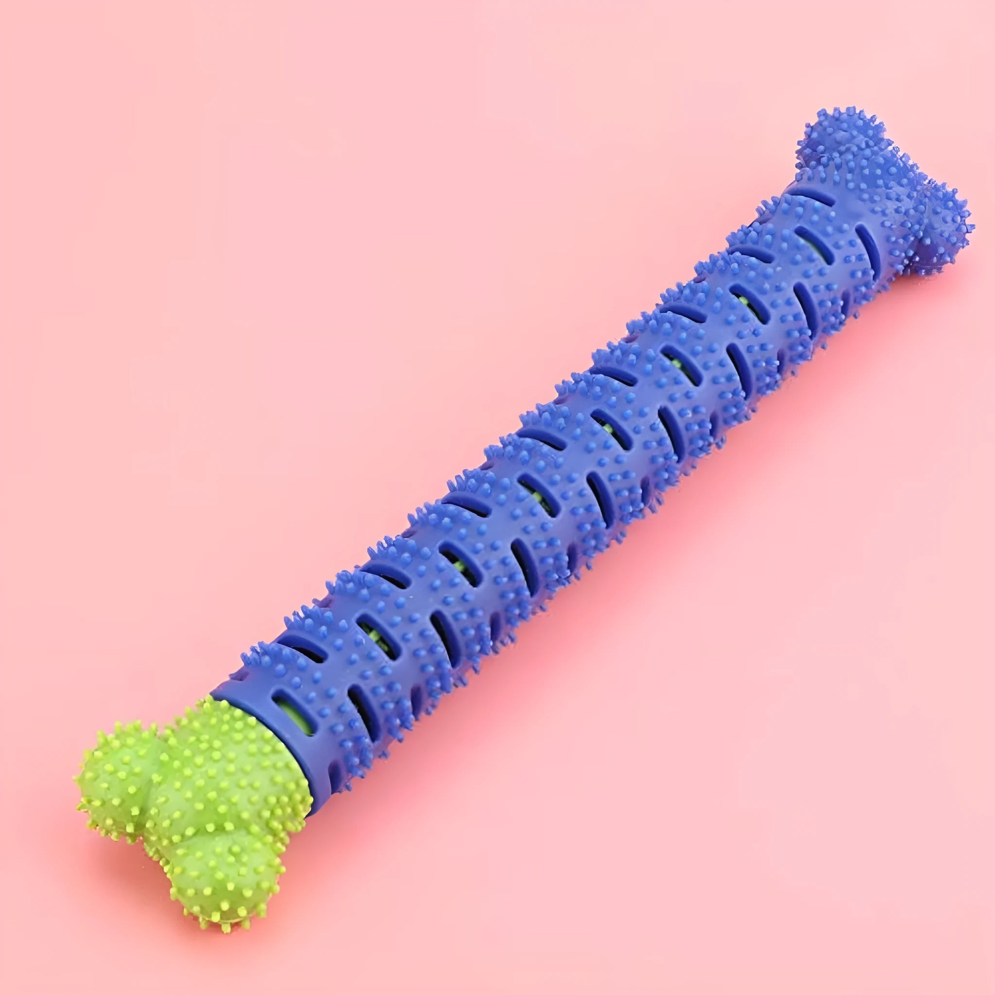 Blue green silicone dog toothbrush chew toy with bristles and nodules for teeth cleaning.