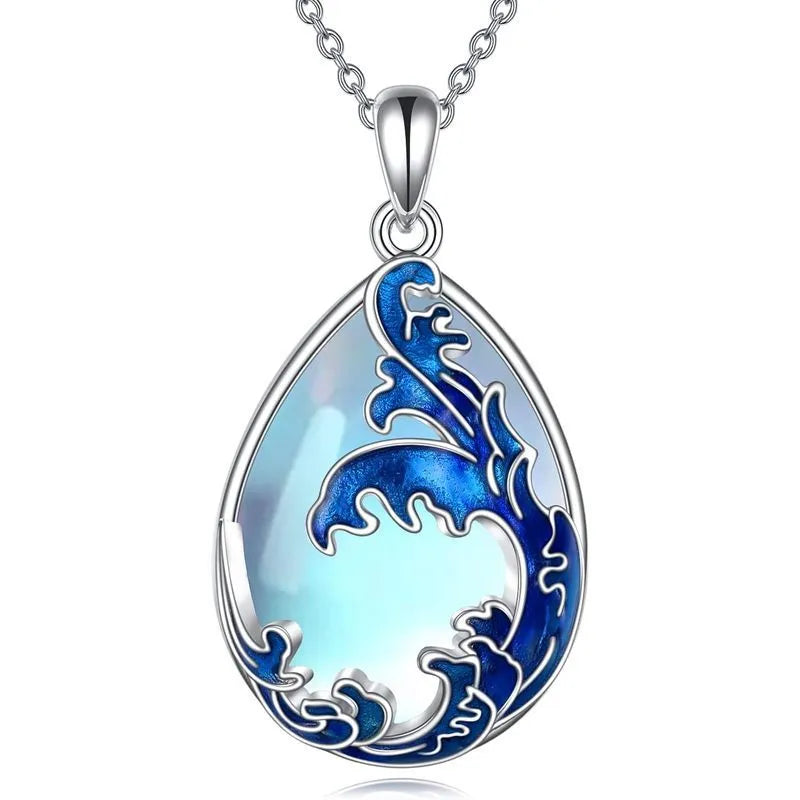 Blue heart-shaped alloy pendant on a women's necklace.