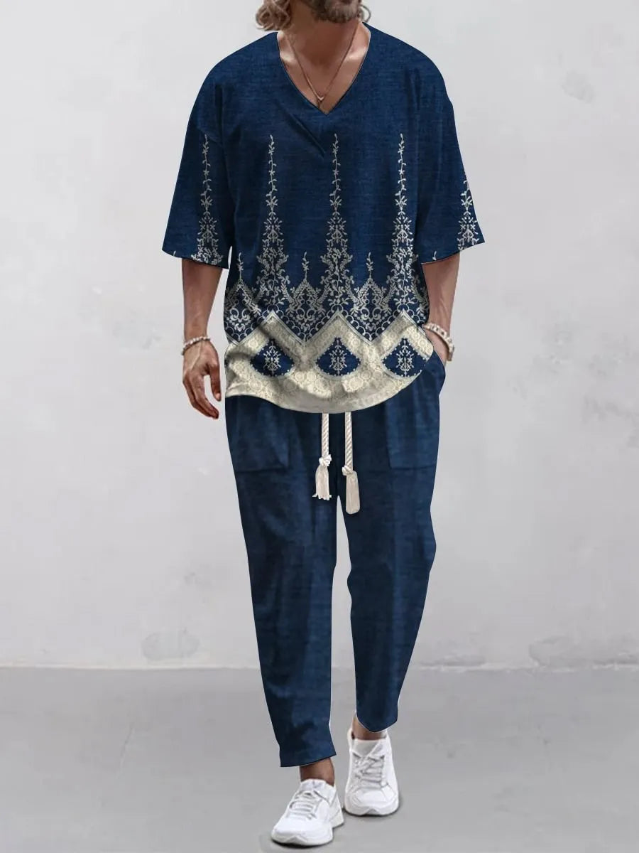 Lightweight cropped sleeve V-neck top and matching trousers suit in a solid colour.