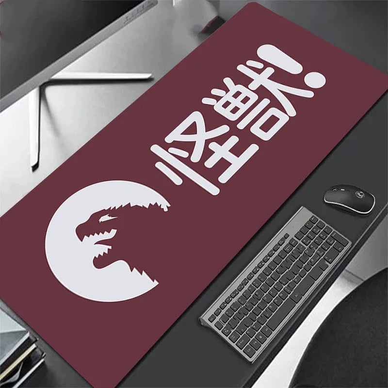 All black extra long mouse pad with precision overlock stitching on a desk