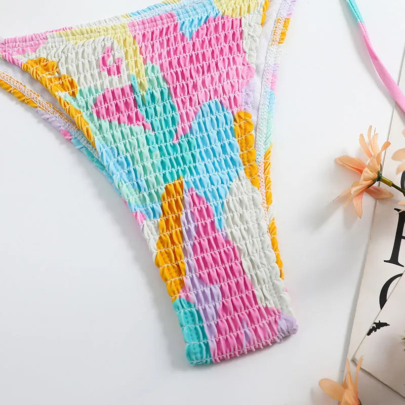 Multicolour floral printed women's triangle bikini with smocking craft details on the fabric.