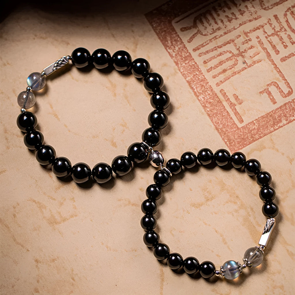 Obsidian Buddha beads couple bracelet DIY kit showing 8mm and 10mm beads with elastic cord