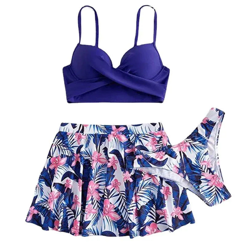 Women's three-piece high-waist bikini swimsuit in polyester fabric showing stomach coverage design