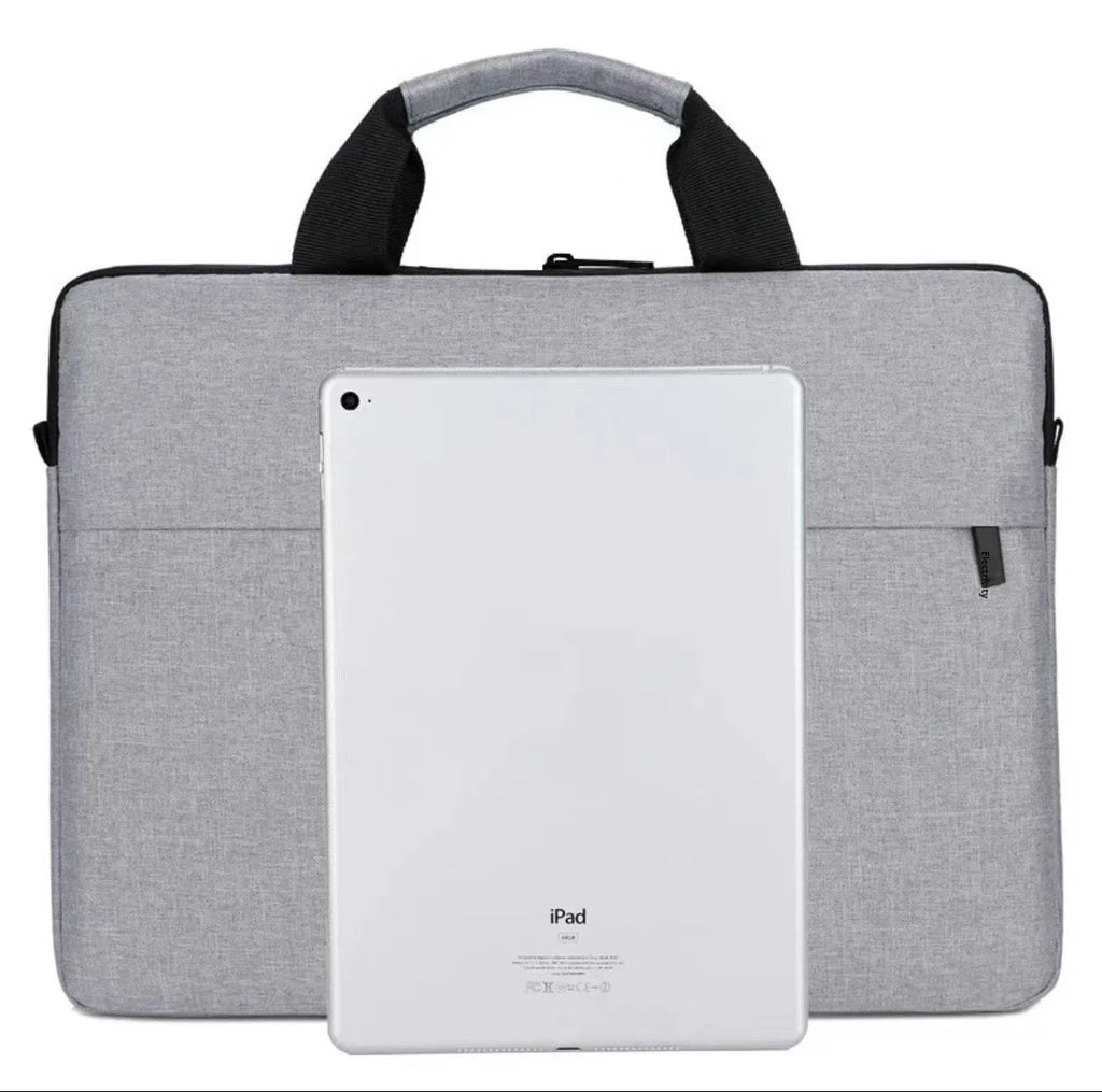 Grey Oxford cloth laptop bag with visible sewing thread detailing and expandable compartment