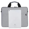 Grey Oxford cloth laptop bag with visible sewing thread detailing and expandable compartment