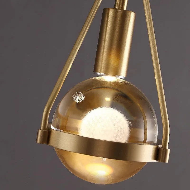 Modern copper and crystal chandelier light fixture for bedroom or commercial use.