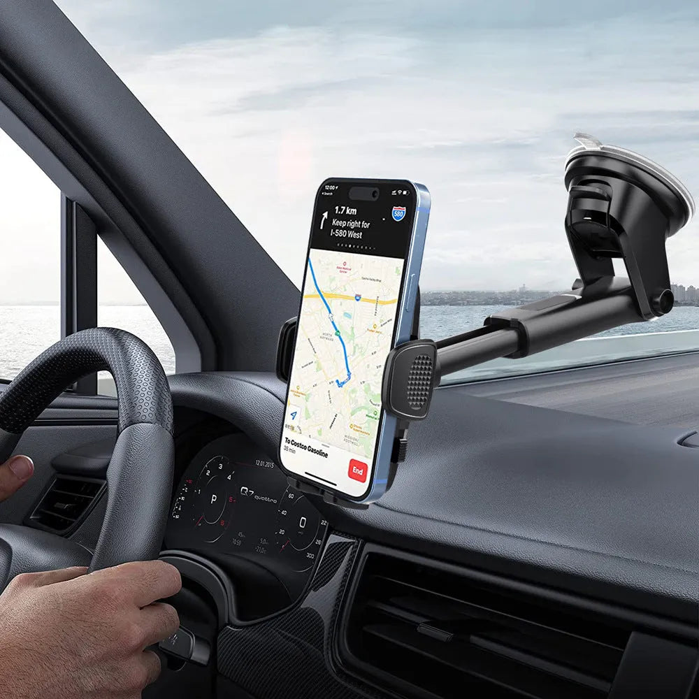 Black plastic car mobile phone bracket with suction fixing and universal support frame for in-car navigation.