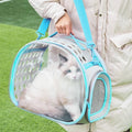 Transparent hard EVA cat carrier backpack in lake blue colour showing interior dimensions