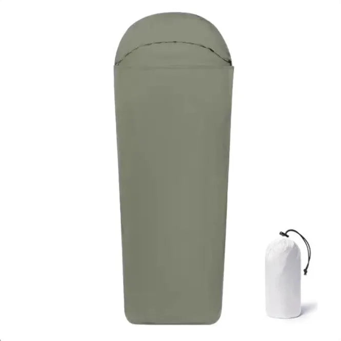 Blue mummy-style nylon camping sleeping bag shown rolled, highlighting its tapered 210cm length and compact design.