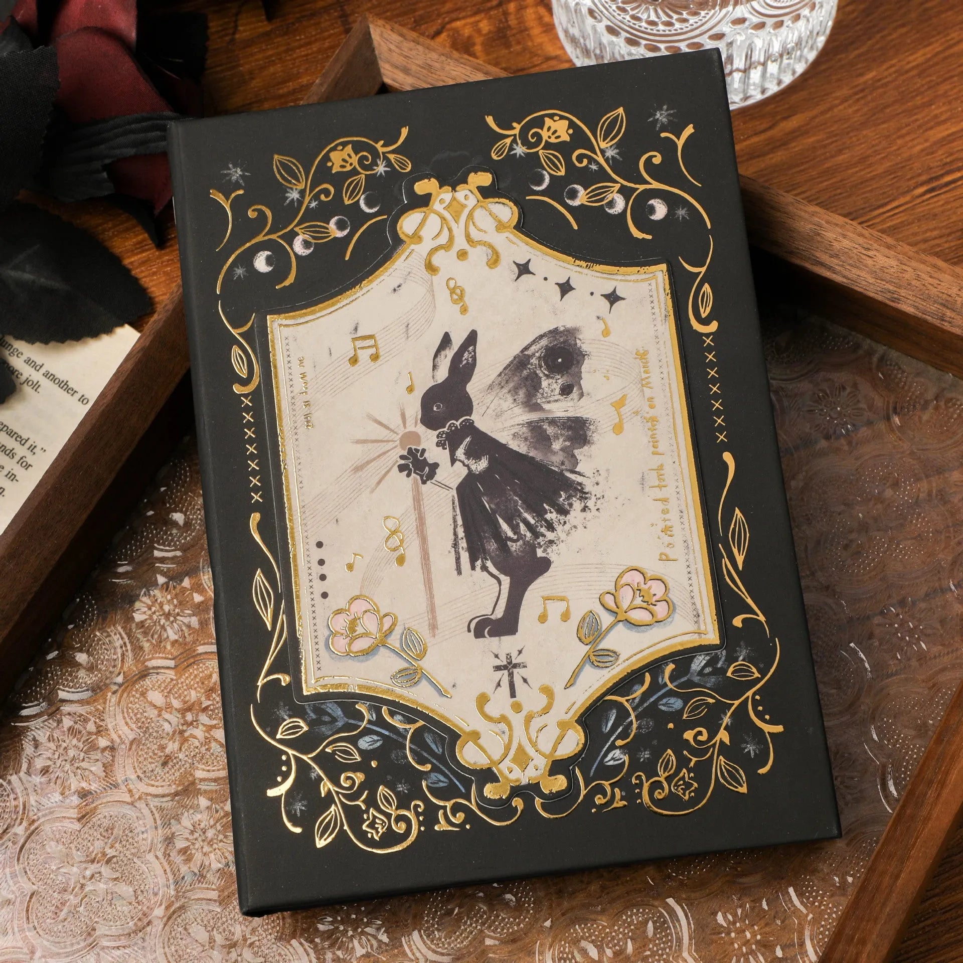 THALO A5 retro gothic style notebook showing cover design options on a wooden table.