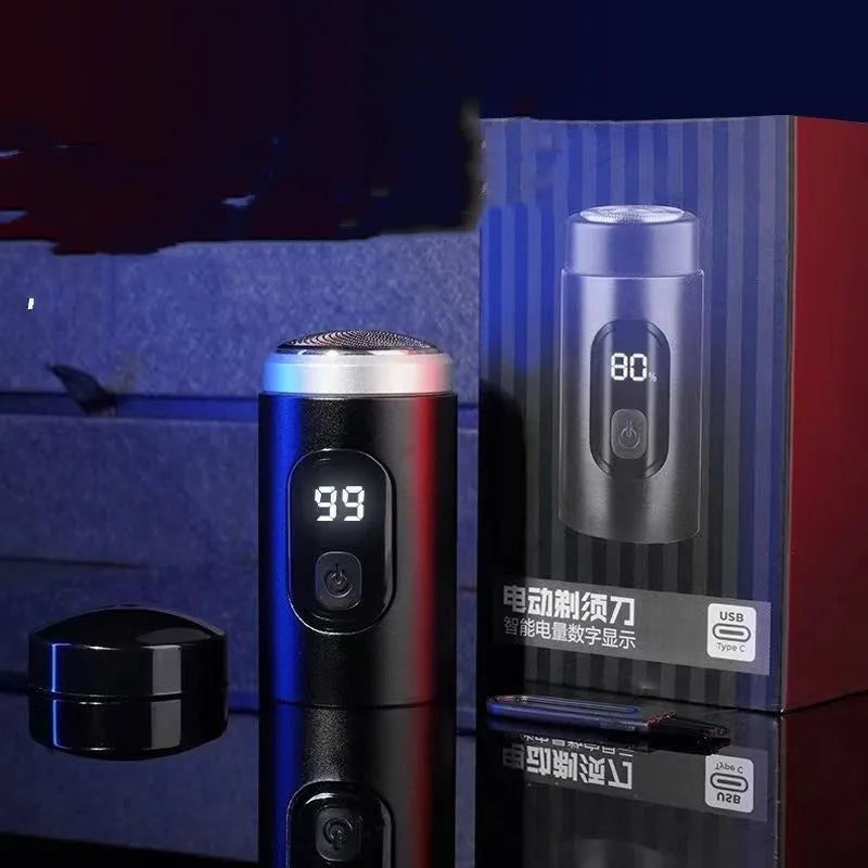 Black mini portable rechargeable electric shaver with USB cable and cleaning brush on a white background.