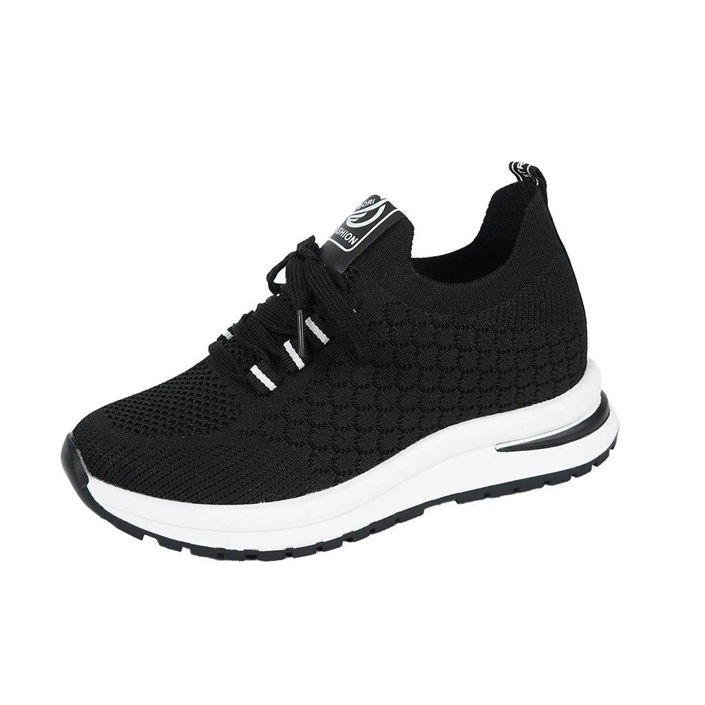Women's black platform flat pumps with mesh upper and lace-up design on rubber sole