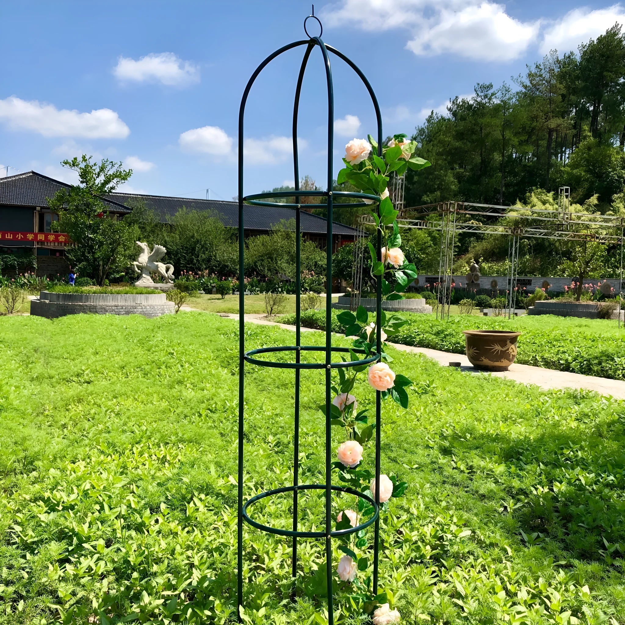 Dark green wrought iron plant climbing stand with lattice design measuring 188cm tall