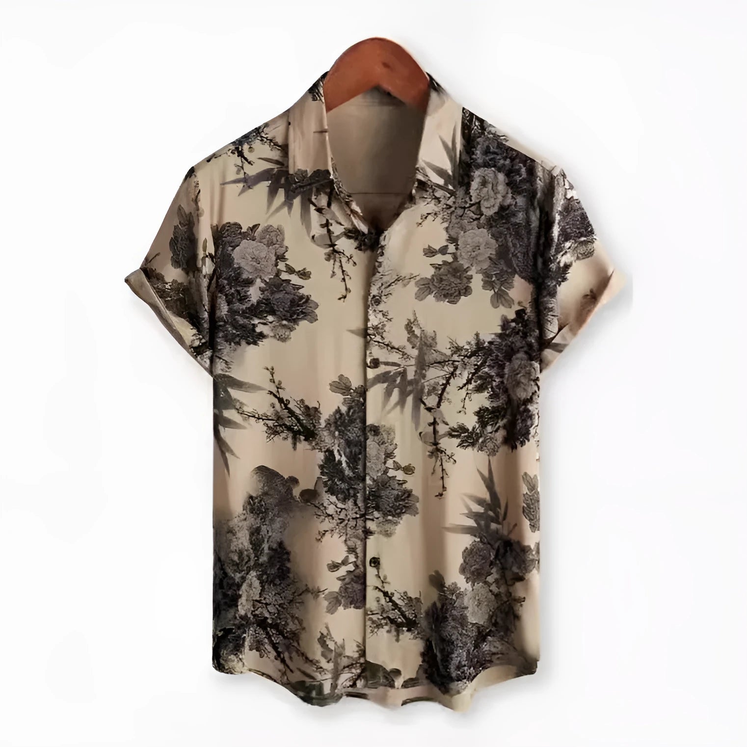 A man wearing a short sleeve floral print Hawaiian shirt with a button-up front and lapel collar.