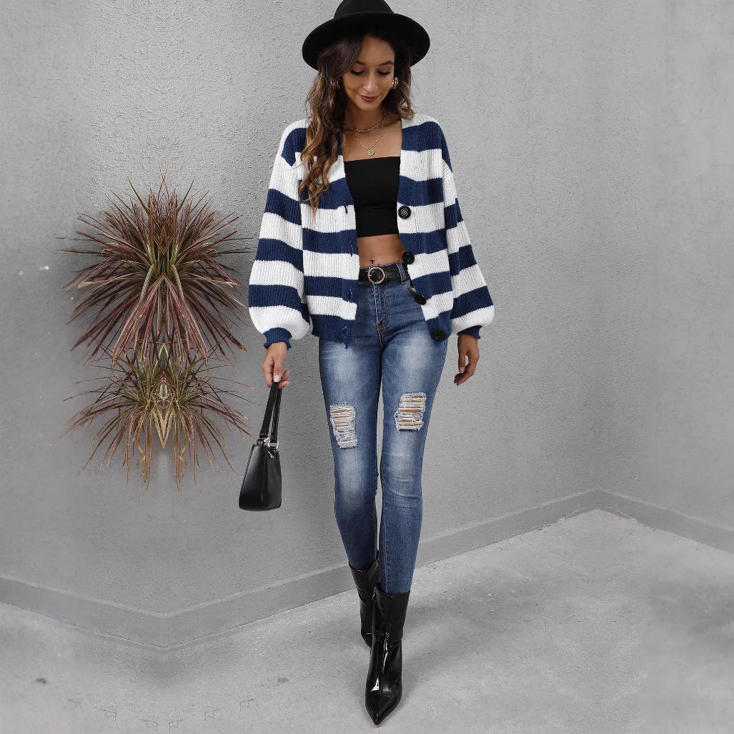 Blue striped women's cardigan sweater with button front and deer plush texture.