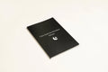 Black leather-bound dream journal notebook with business simplicity style.