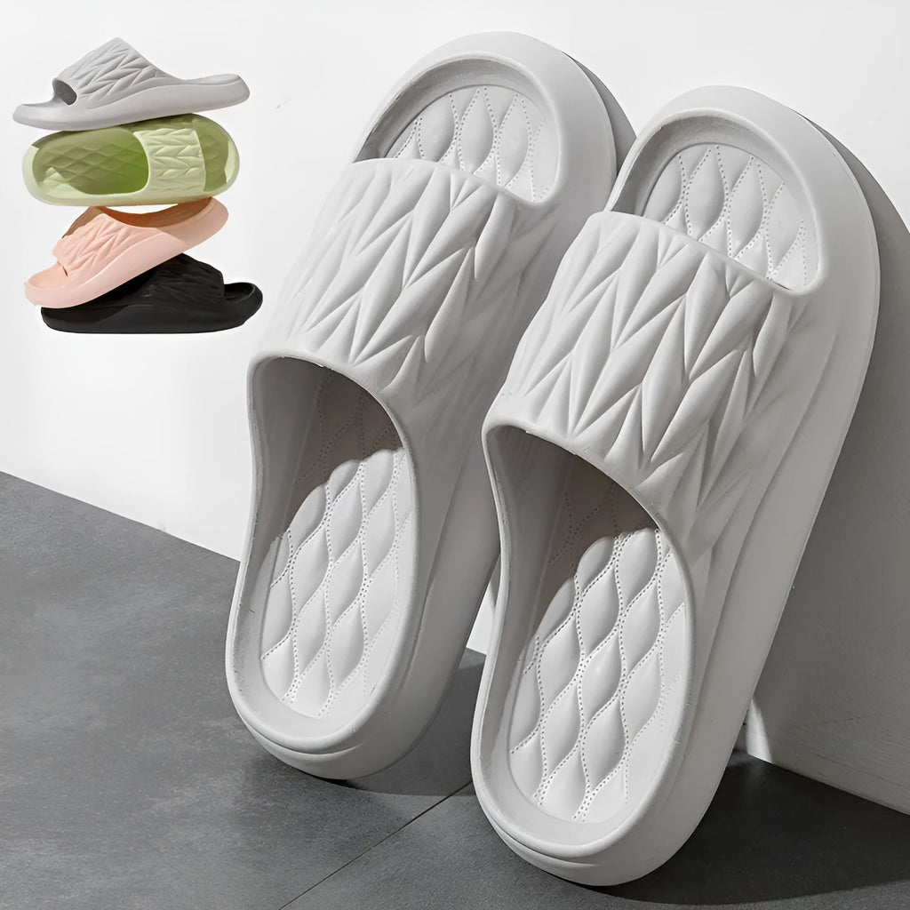Leaf texture patterned EVA slippers for indoor household use, shown in various colours.