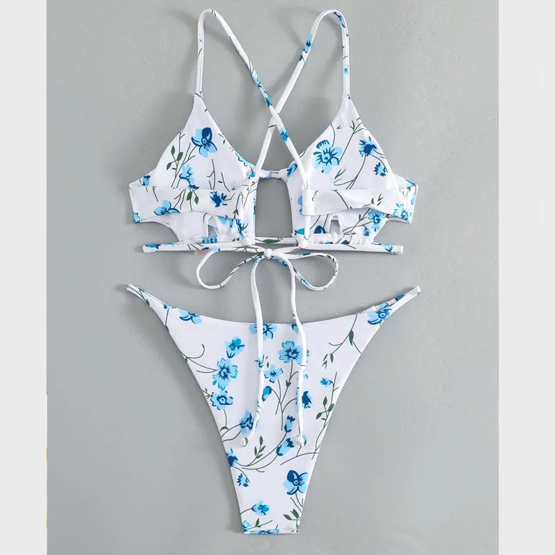 Women's floral swimsuit set with tie-neck triangle top and matching shorts