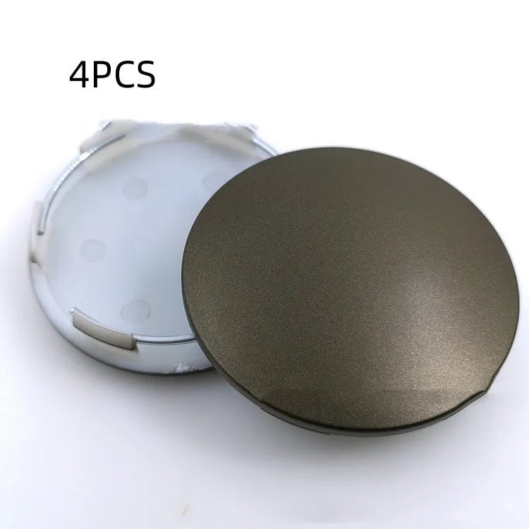 65mm diameter car wheel hub centre cap in antique copper finish with metal emblem.
