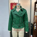 Black punk-style short jacket with a Peter Pan collar, pointed lapels, and a drawstring waist.