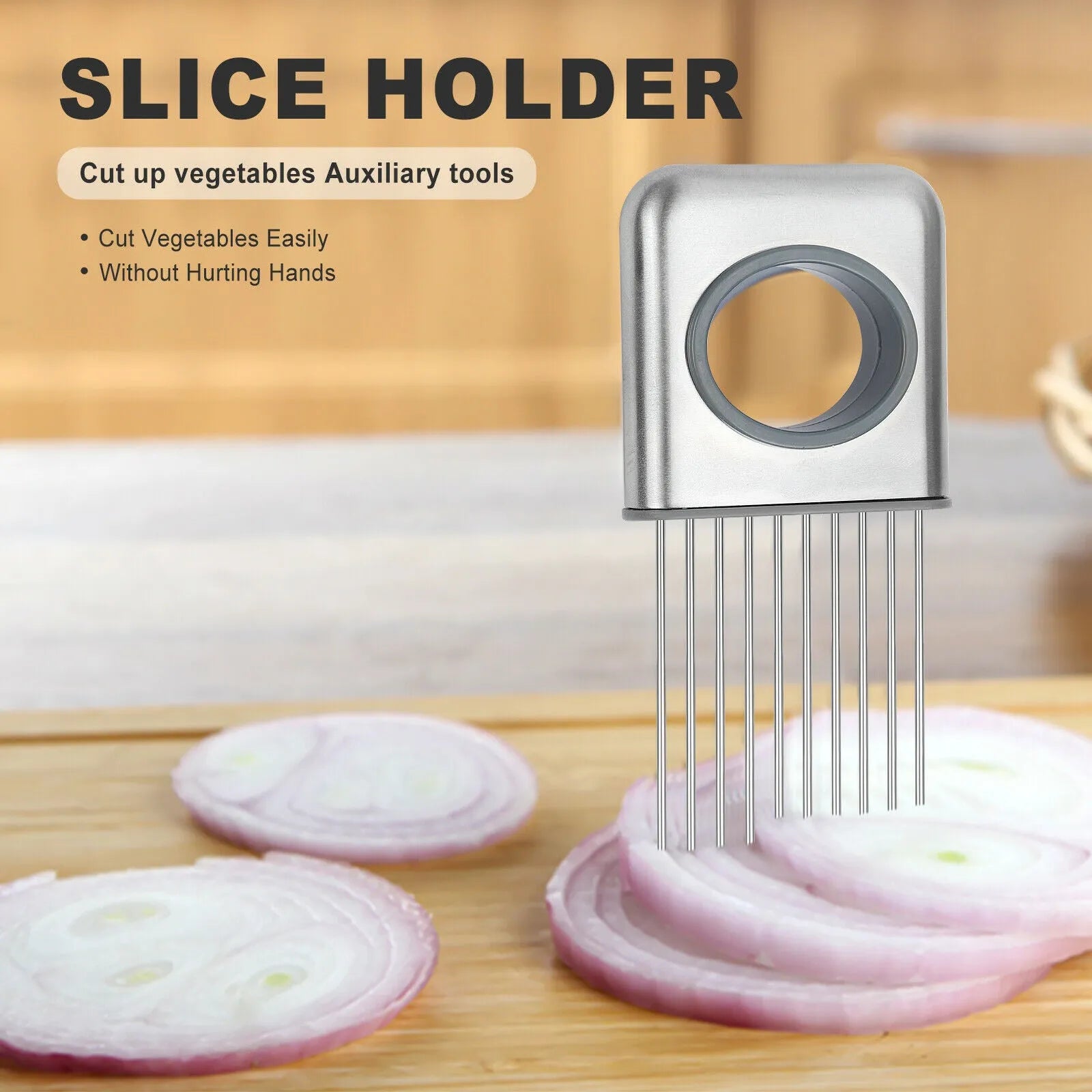 Stainless steel onion holder kitchen tool with sharp prongs and a red finger guard protector on a cutting board.