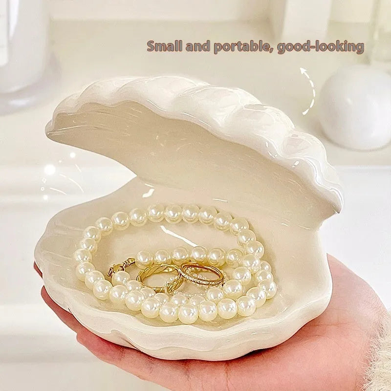 White porcelain storage tray with optional small integrated LED night light, shown in pink and white colour options.