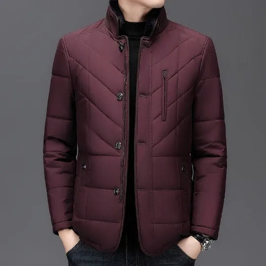 Men's solid colour winter coat with side pockets in dark blue, shown on a hanger.