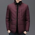 Men's solid colour winter coat with side pockets in dark blue, shown on a hanger.