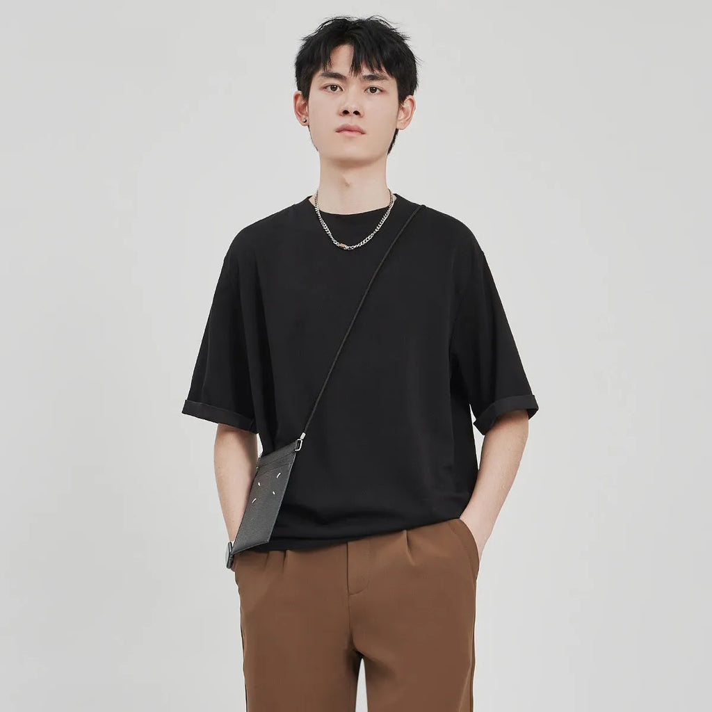 Men's loose drape knit t-shirt in black solid colour with short sleeves casual style