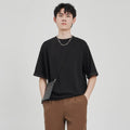 Men's loose drape knit t-shirt in black solid colour with short sleeves casual style